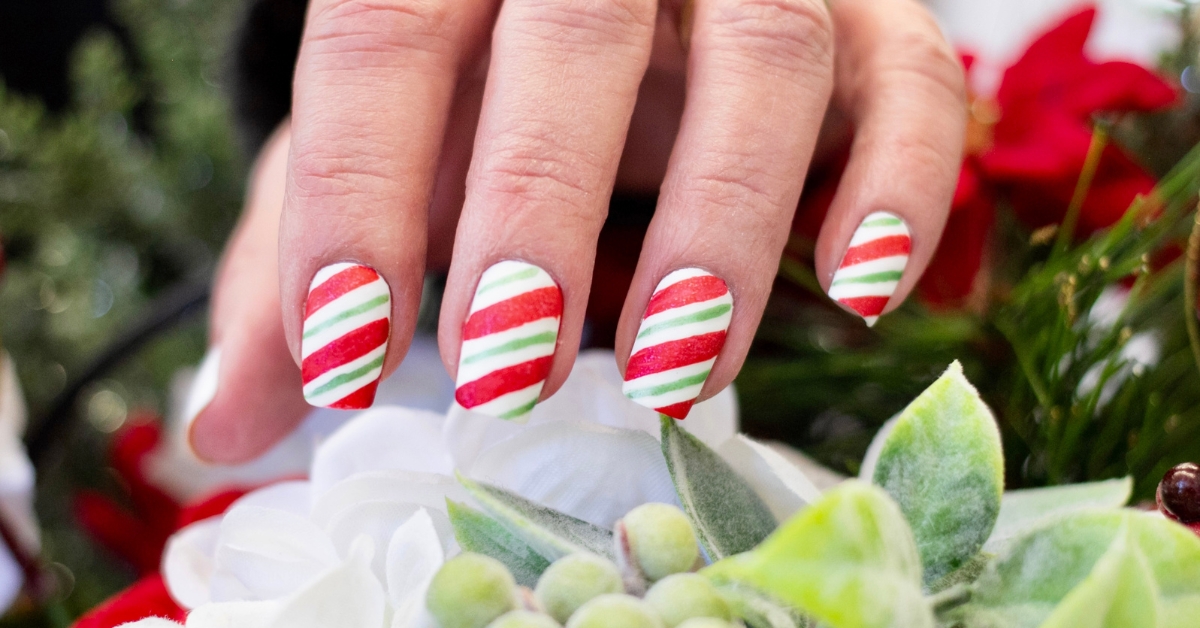 Top Christmas Nail Art Designs for 2025: Festive & Fun! 5 Festive Holly Stripe Nail Art