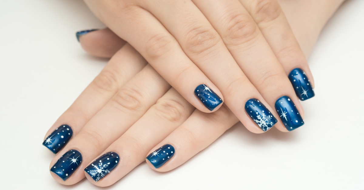 Top Christmas Nail Art Designs for 2025: Festive & Fun! 9 Starry Night Snowflake Nail Art